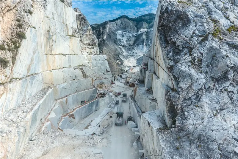 Aerial view of the Bardiglio Light marble quarry in northern Italy, where premium blue-gray marble blocks are extracted for architectural and interior design projects.