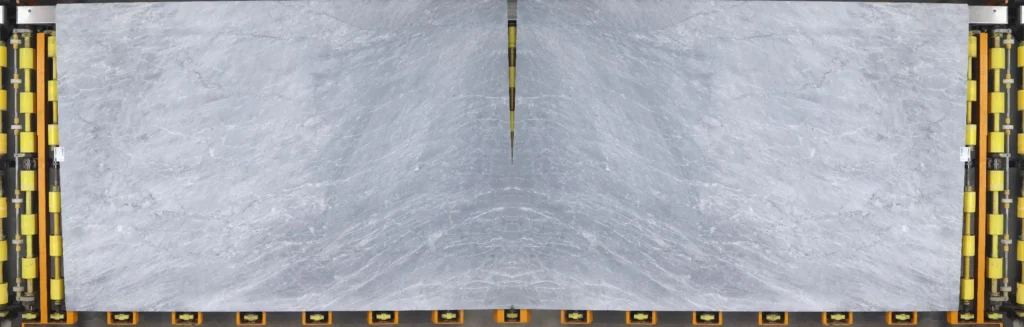 Bookmatched Bardiglio Light marble slabs featuring soft grey veining and a symmetrical pattern, ideal for luxury feature walls, shower walls, fireplace surrounds, and commercial interiors.