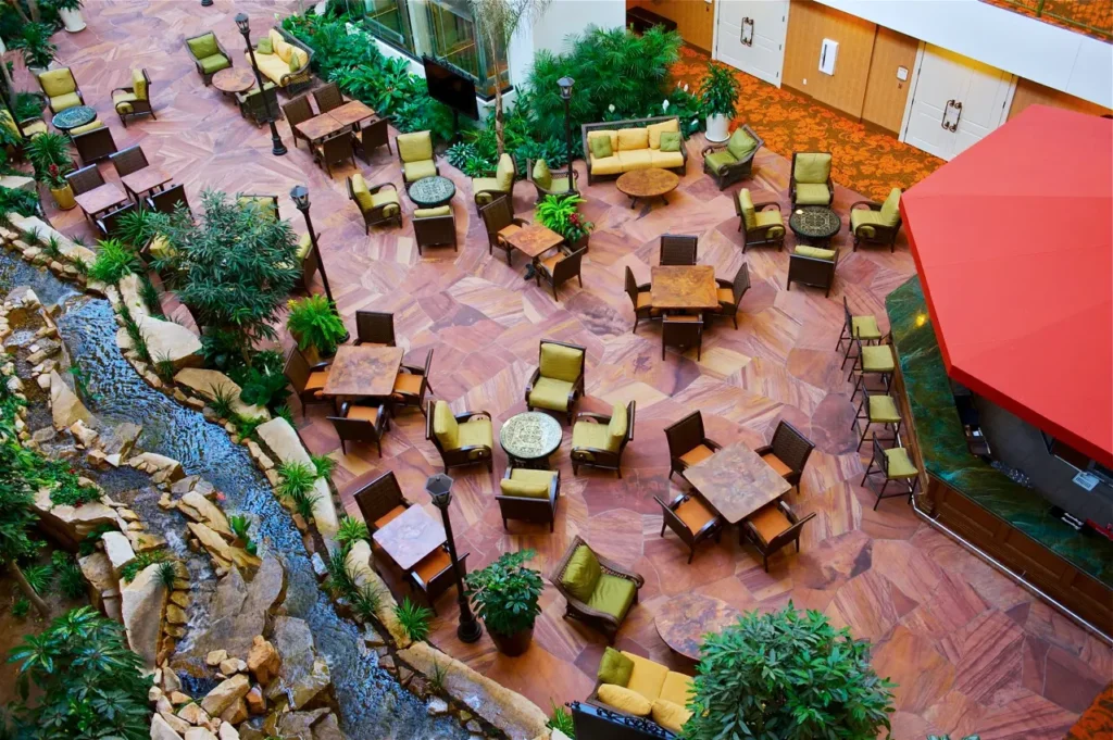 Desert Blend Meta Quartzite flooring installed in a luxury hotel atrium featuring warm desert tones and natural movement.