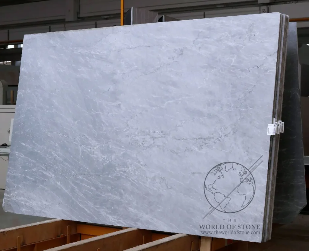Full slab of Bardiglio Light Italian marble featuring soft blue-gray tones, delicate white veining, and subtle linear movement available from The World of Stone.