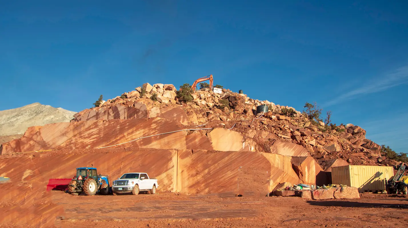 Las Vegas Rock meta quartzite quarry at Rainbow Quarry in Goodsprings, Nevada showing large architectural stone blocks and active quarry operations
