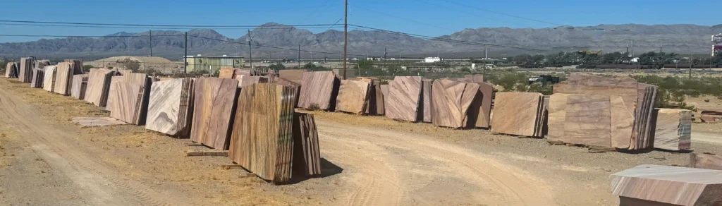 Rows of produced-to-order Meta Quartzite slabs at the Las Vegas Rock production yard in Jean, Nevada, awaiting fabrication and shipment.