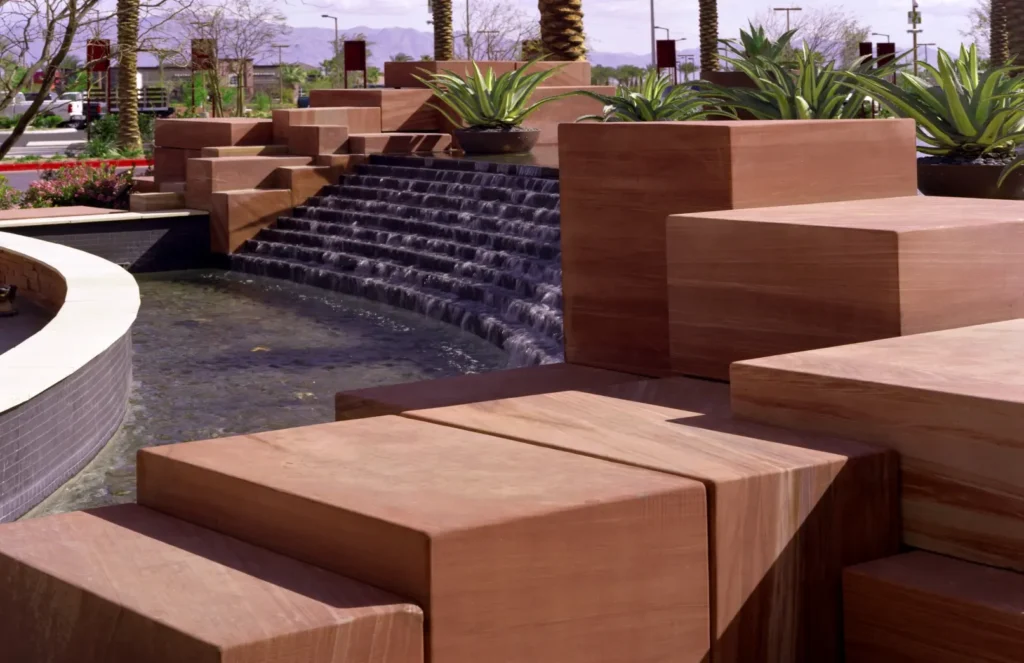 Sierra Smoke Meta Quartzite used in a contemporary outdoor water feature with dimensional stone blocks and cascading waterfall.